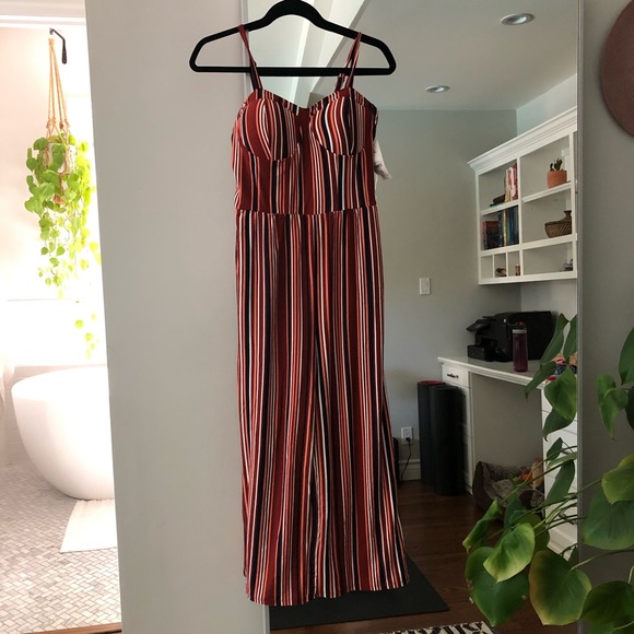 Pants - Juniors Striped jumper. Adjustable straps. Size M